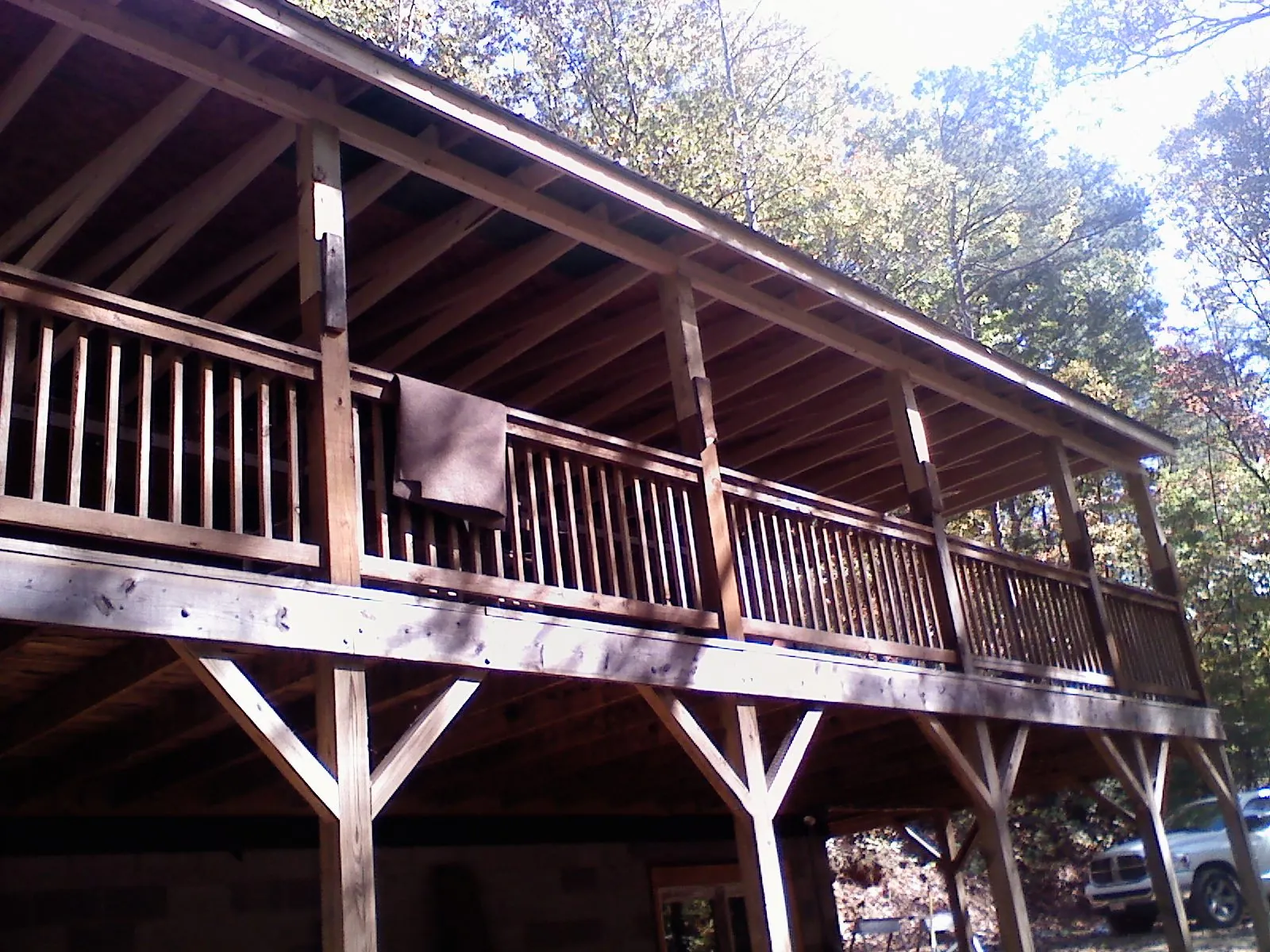 Timber framing under a new elevated porch and deck — Roof Leak Repair in Willernie by Roofing Brothers